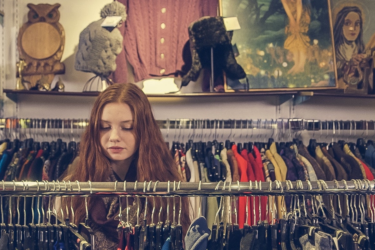 woman shopping for clothes in a store